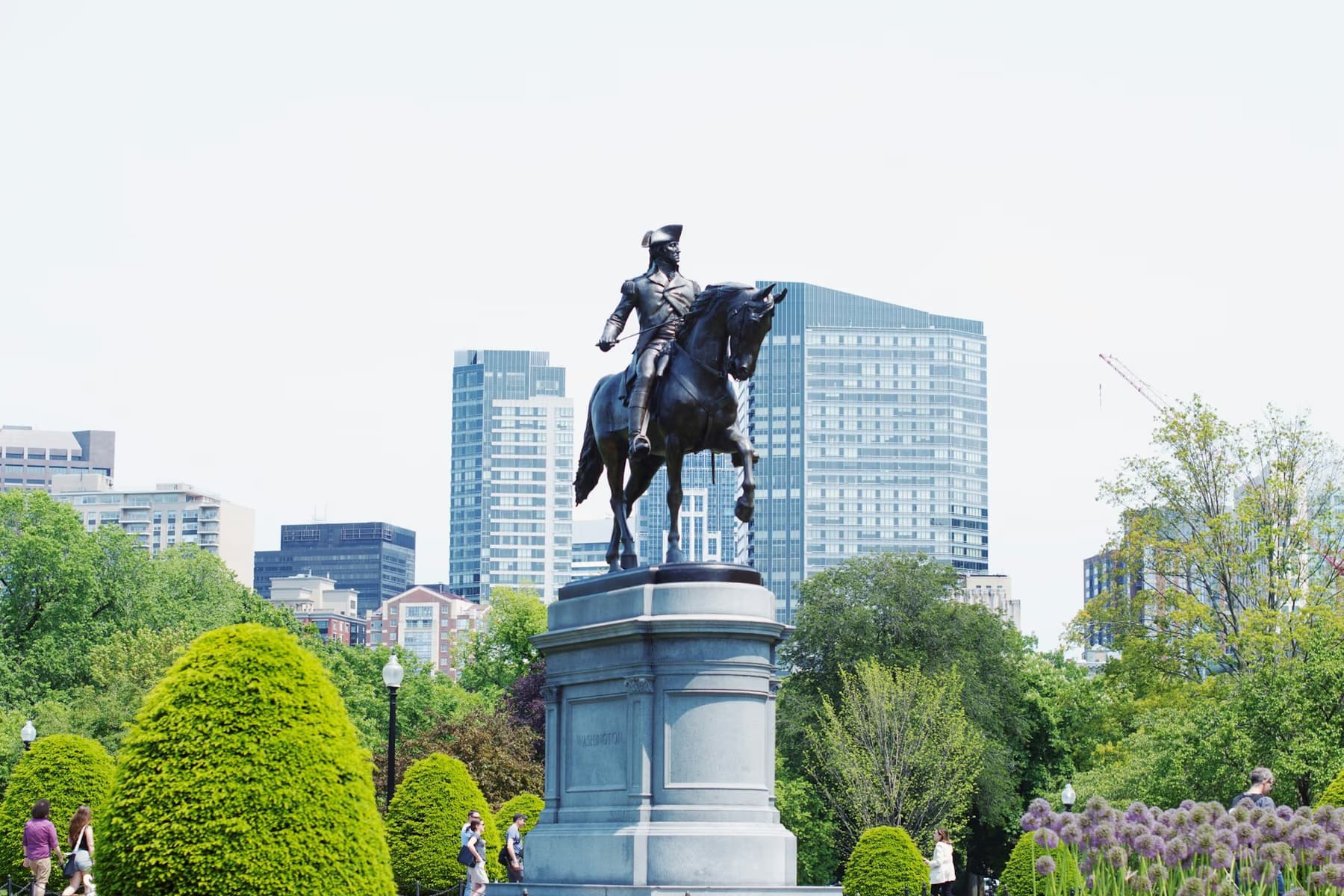 The George Washington statue among trees in the Boston Public Garden