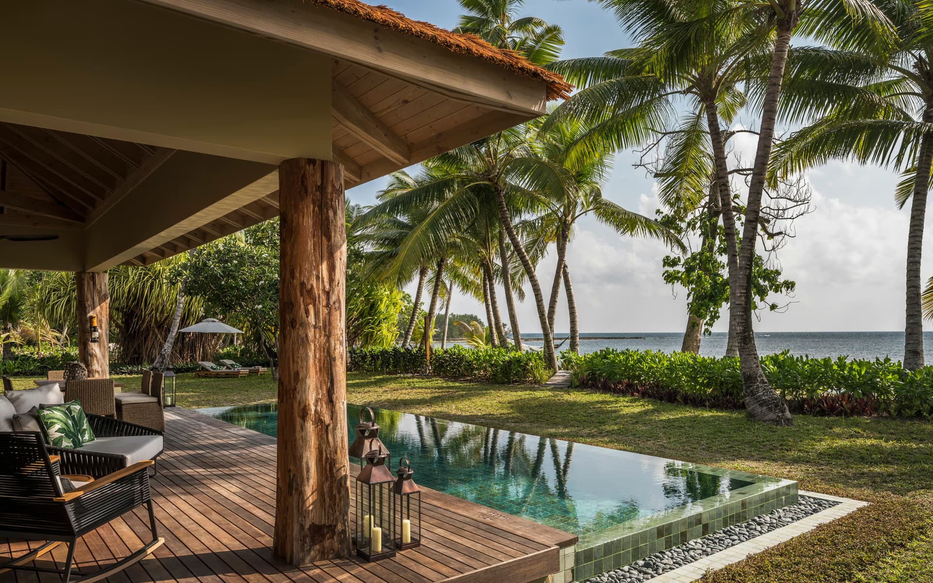 Villa terrace and pool at Four Seasons Resort Seychelles at Desroches Island
